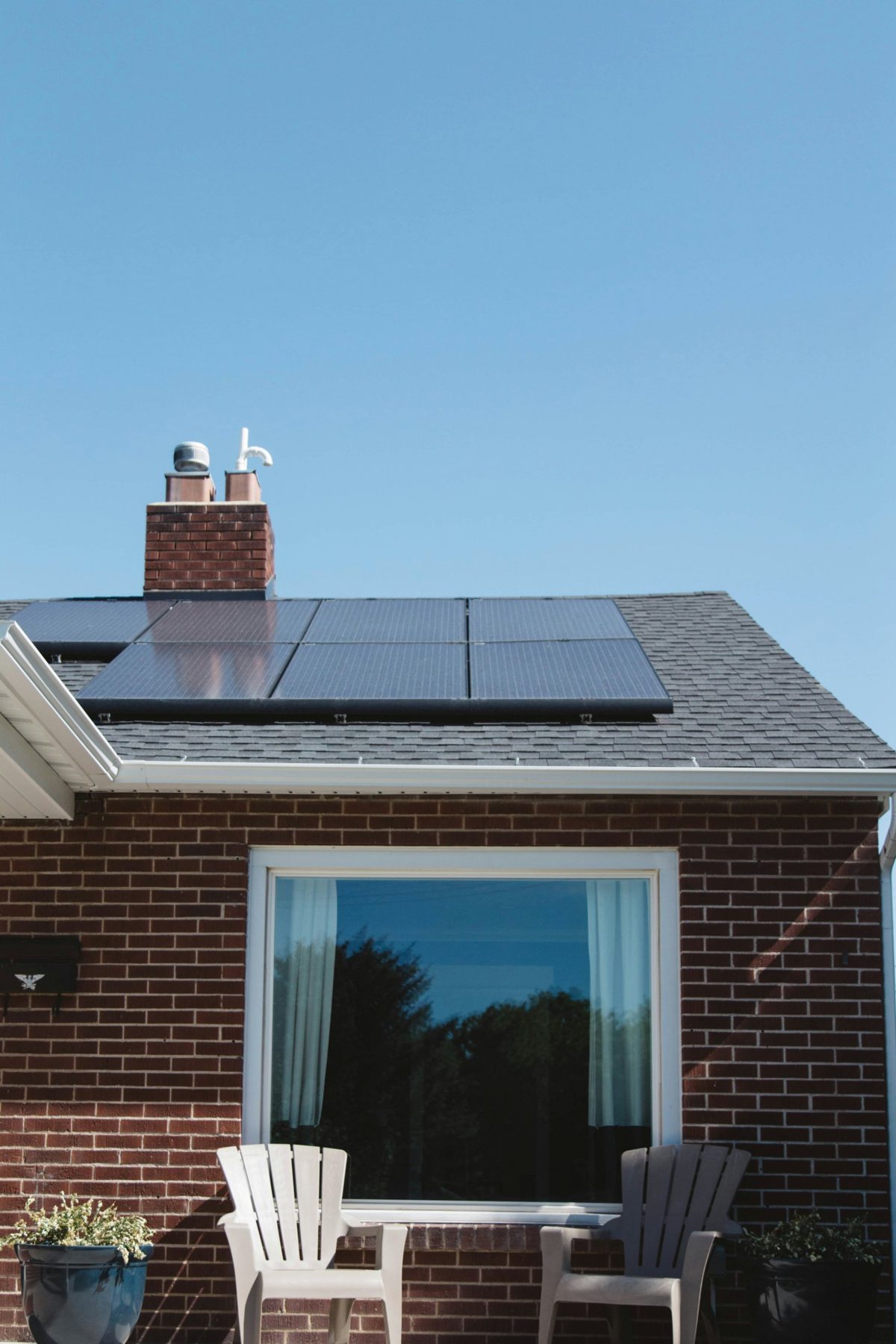 Brick home with a finished solar array on its roof
